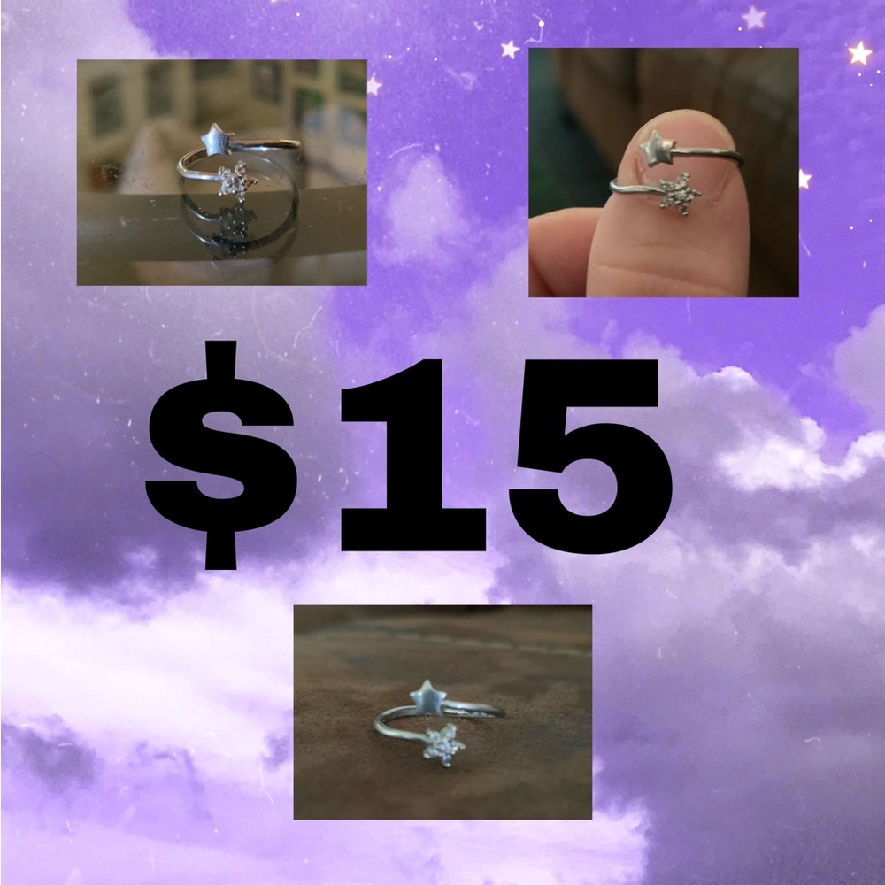 Silver ring with stars. Adjustable so it will fit anyone. Worn maybe twice.